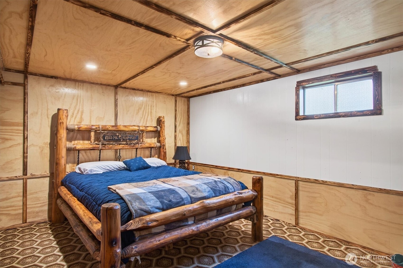 1210 8th Avenue Longview, WA 98632 - Photo 25 of 37 a bedroom with a bed and a table