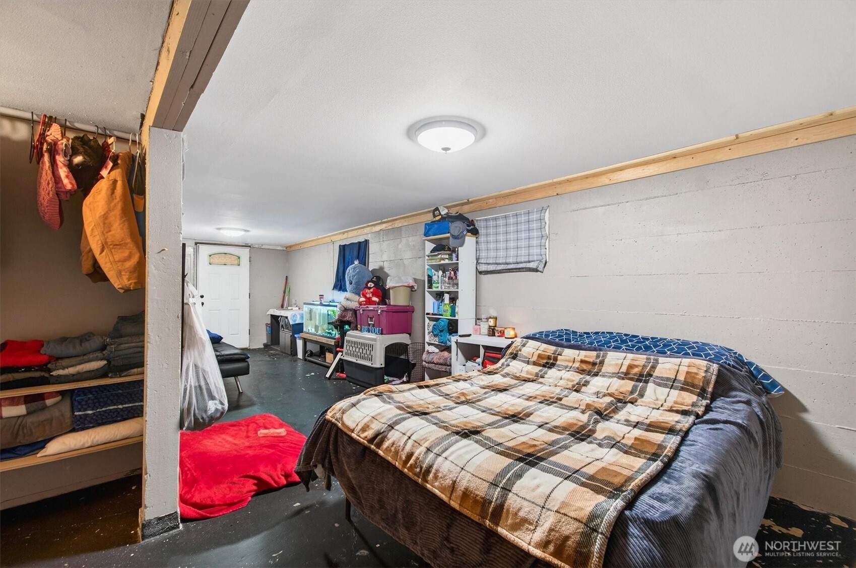 1210 8th Avenue Longview, WA 98632 - Photo 30 of 37 a bedroom with a bed and a couch