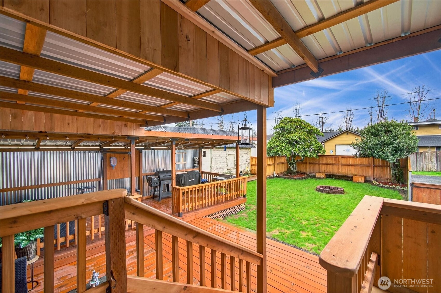 1210 8th Avenue Longview, WA 98632 - Photo 31 of 37 a view of a backyard with sitting area
