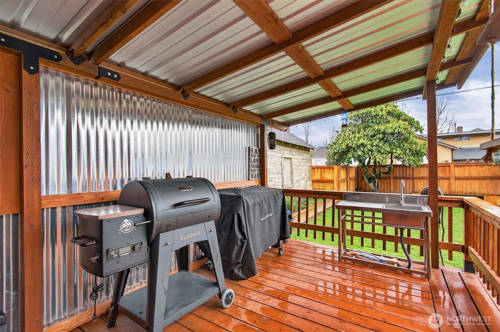 1210 8th Avenue Longview, WA 98632 - Photo 34 of 37 a view of a balcony with furniture and wooden floor