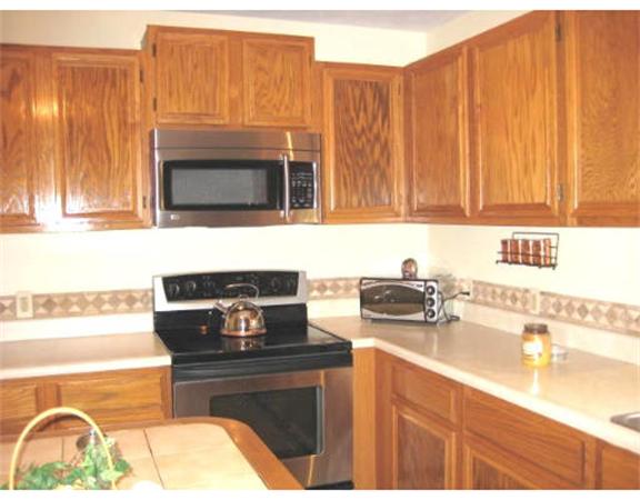 13 Allen Road Sturbridge, MA 01566 - Photo 7 of 16 a kitchen with a stove and a sink