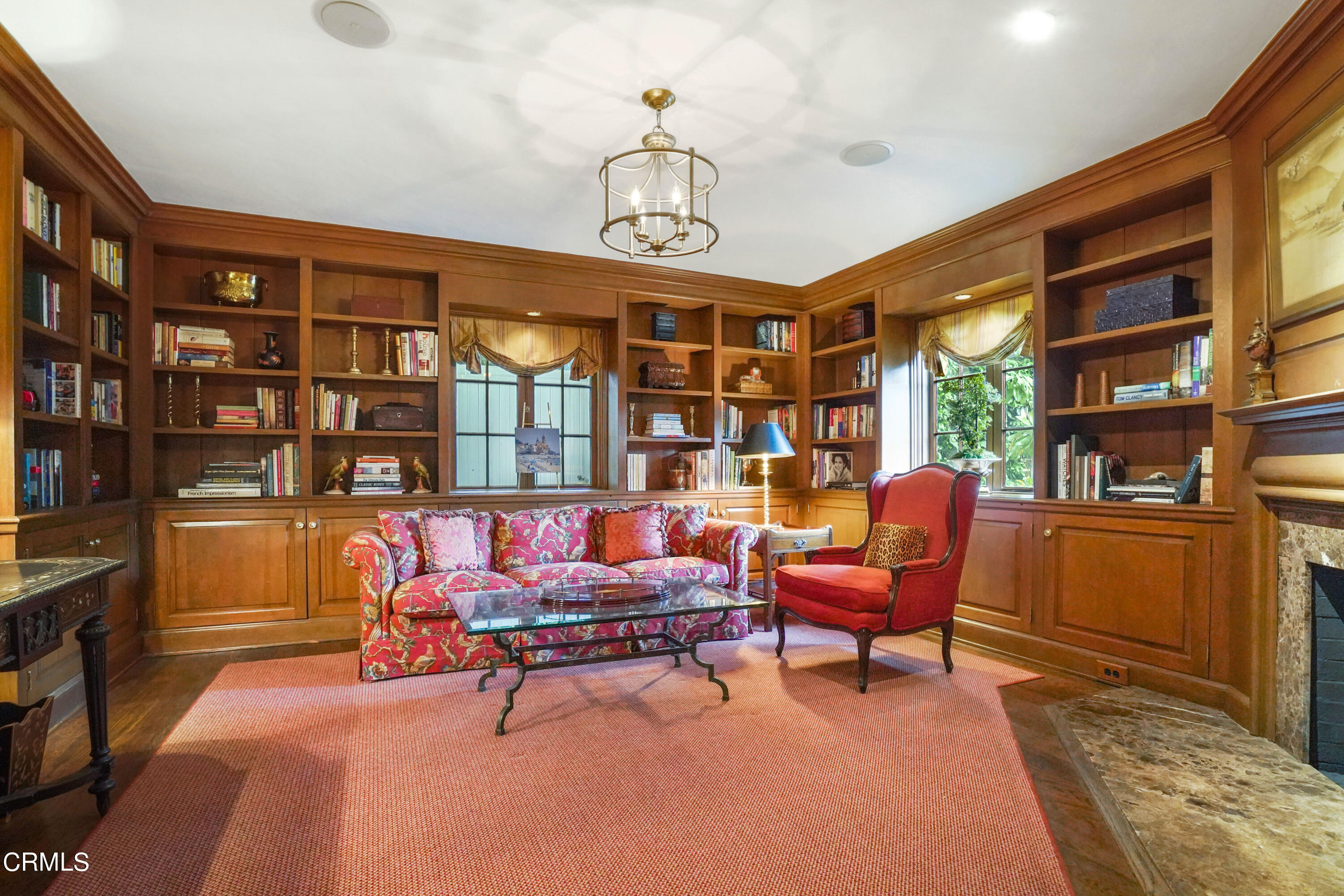 512 Arroyo Square South Pasadena, CA 91030 - Photo 11 of 55 a living room with furniture a chandelier and a bookshelf