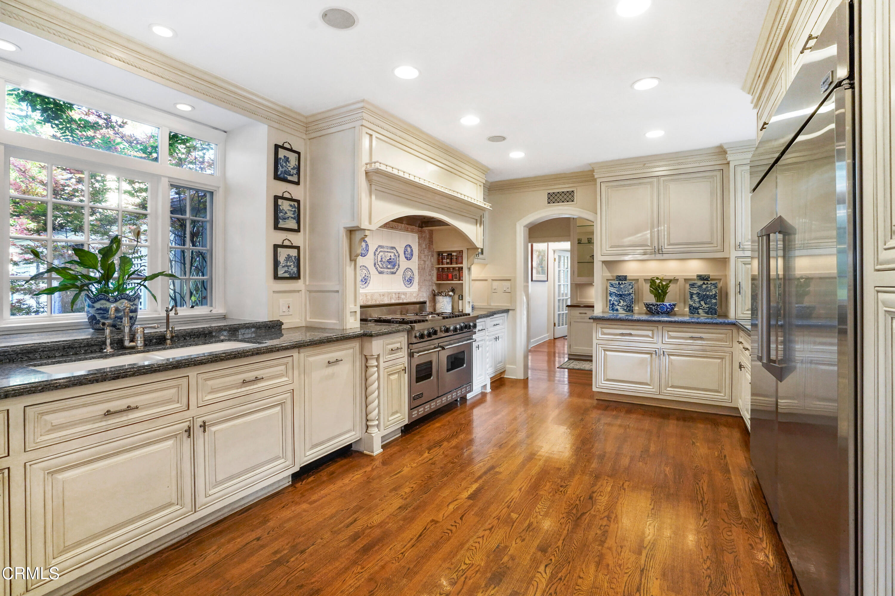 512 Arroyo Square South Pasadena, CA 91030 - Photo 17 of 55 a large kitchen with cabinets wooden floor and stainless steel appliances