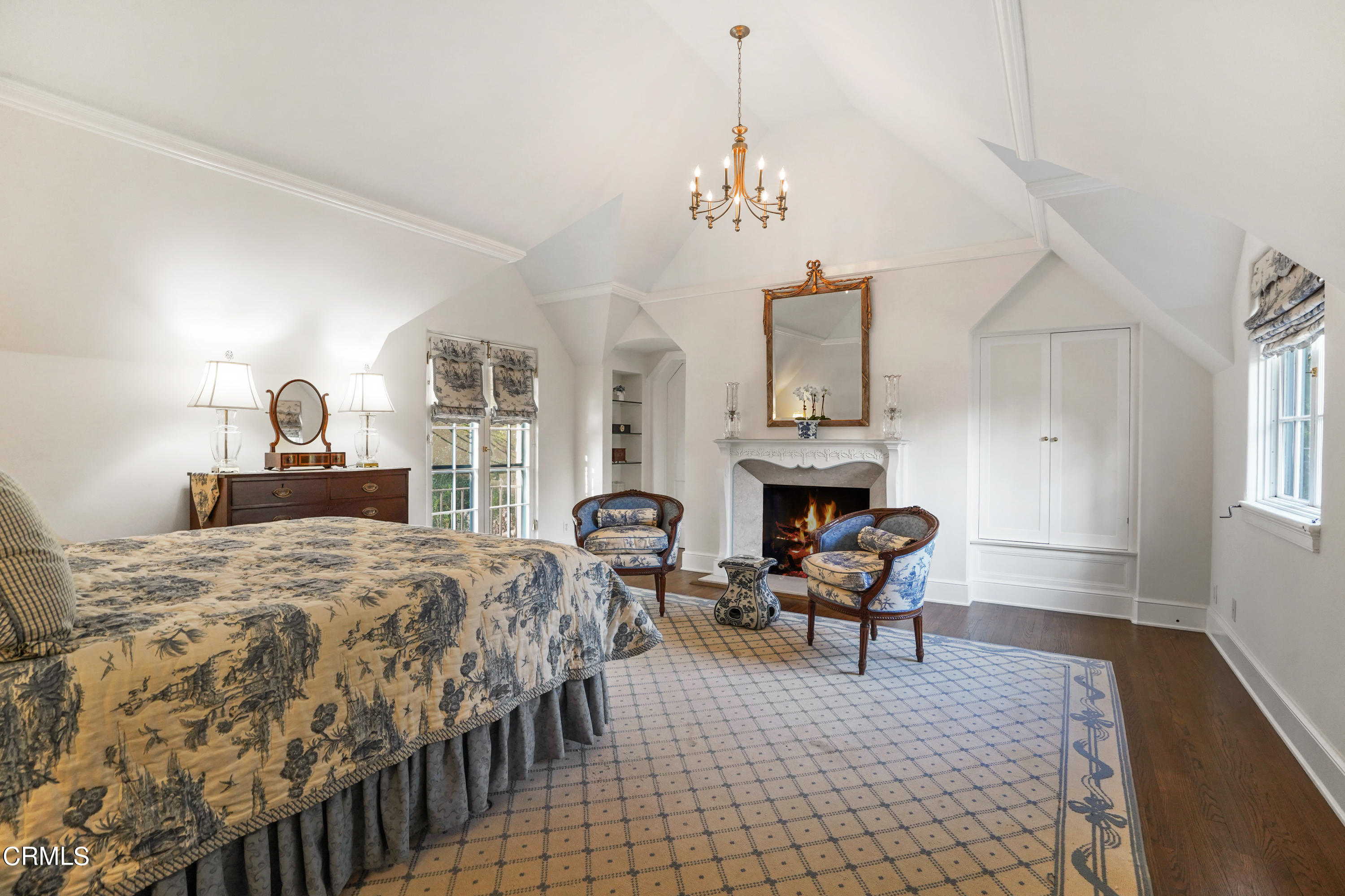 512 Arroyo Square South Pasadena, CA 91030 - Photo 28 of 55 a living room with furniture a fireplace and a chandelier