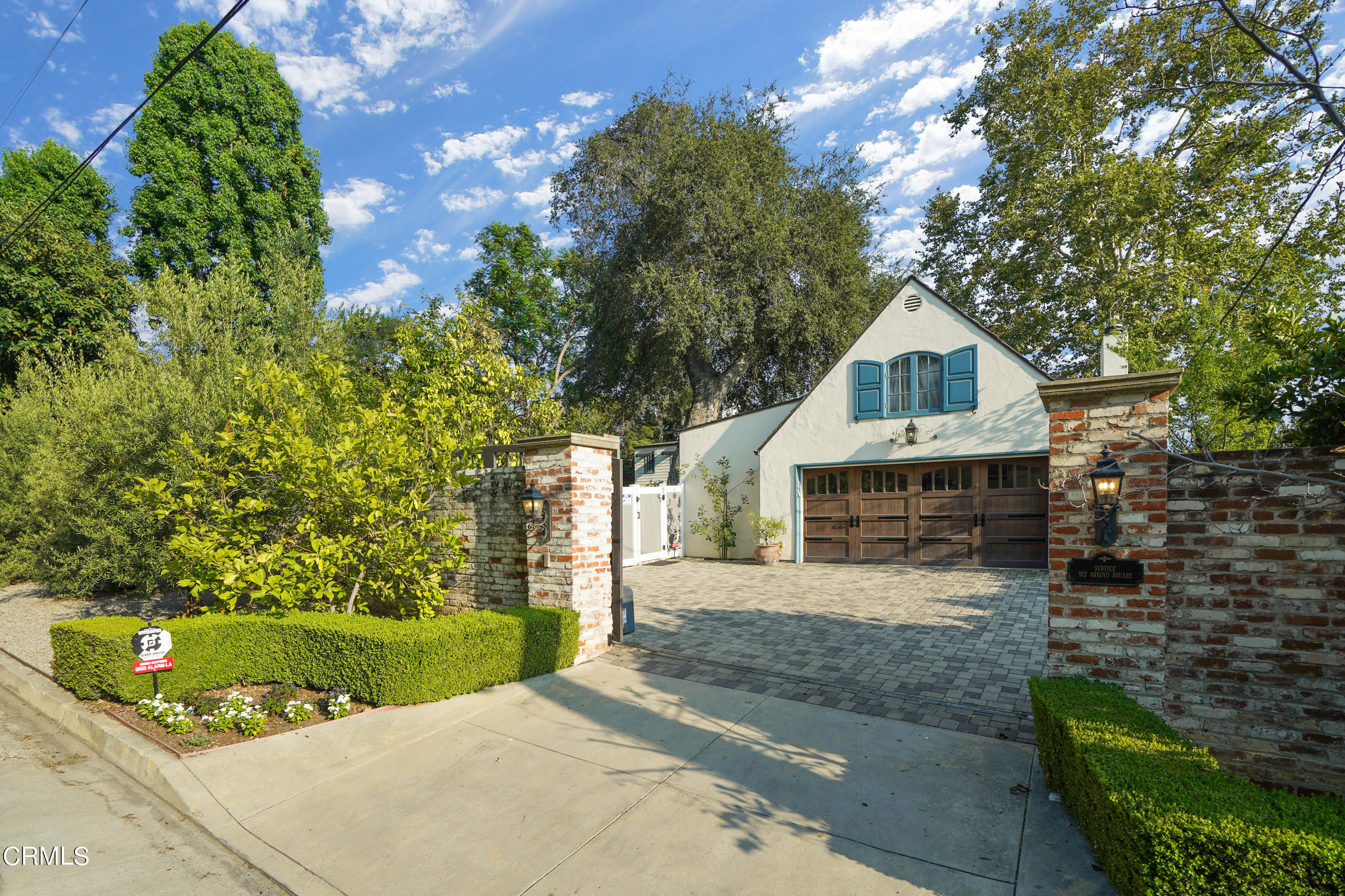 512 Arroyo Square South Pasadena, CA 91030 - Photo 44 of 55 a front view of a house with a yard and garage