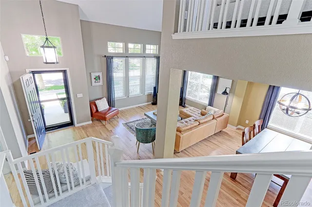 a view of a living room and dining room