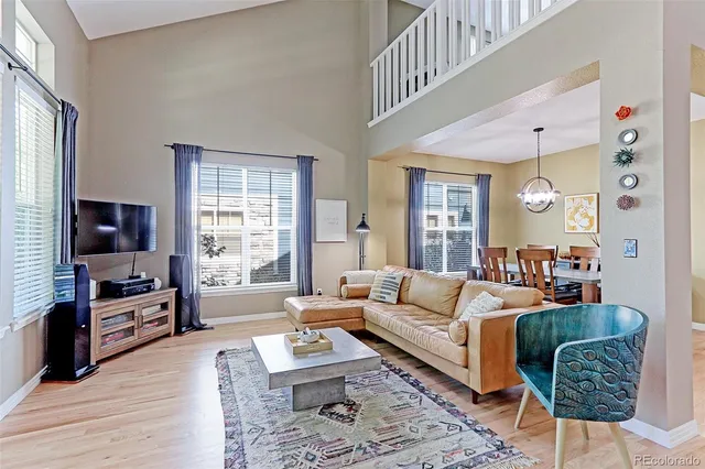 a living room with furniture or couch and a flat screen tv