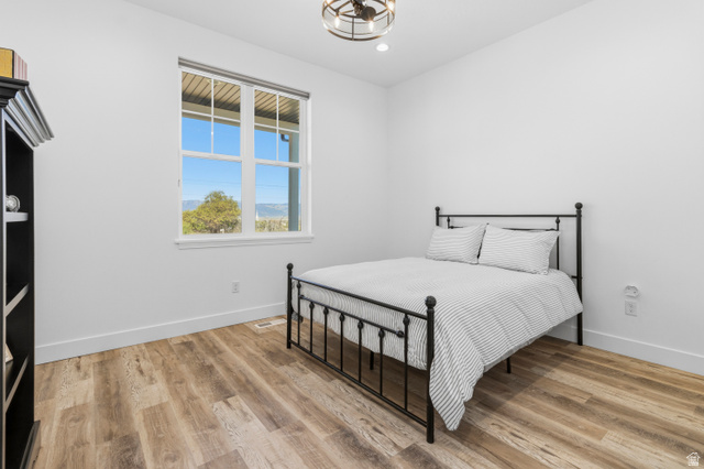 886 North 300th East Spring City, UT 84662 - Photo 17 of 40 Bedroom featuring light wood-style flooring and recessed lighting