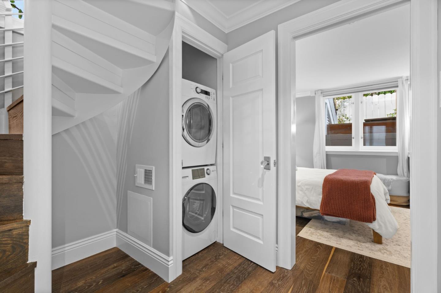 112 27th Street San Francisco, CA 94110 - Photo 18 of 28 a view of living room washer and dryer