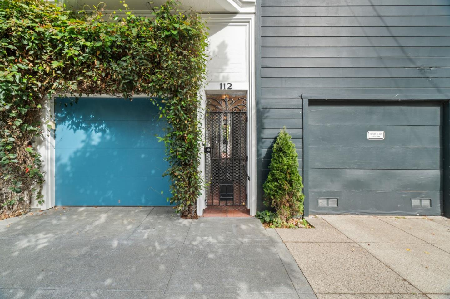 112 27th Street San Francisco, CA 94110 - Photo 27 of 28 a front view of a house with garden