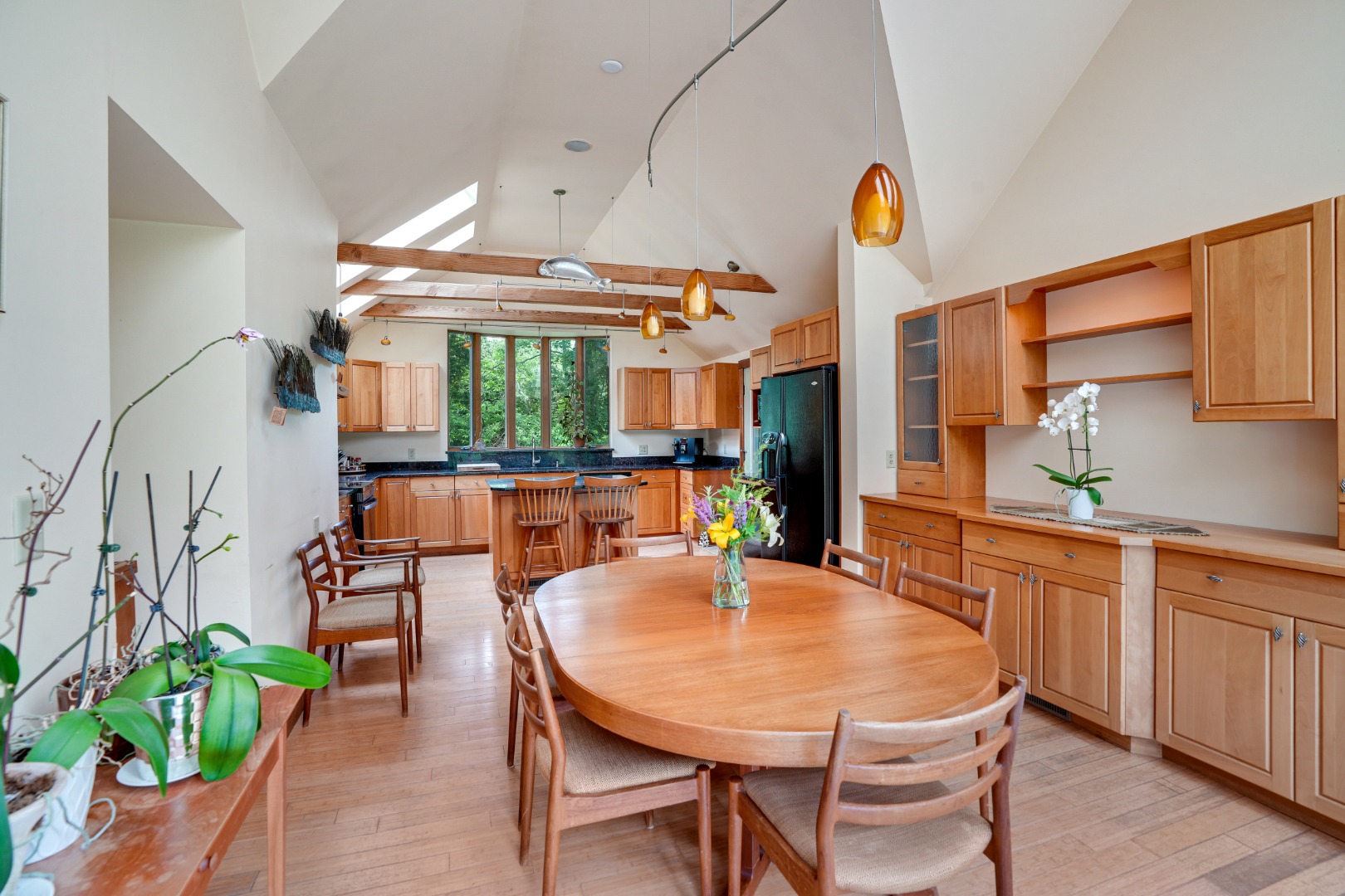 174 Middle Road Chilmark, MA 02535 - Photo 3 of 40 a dining room with furniture a window and kitchen view