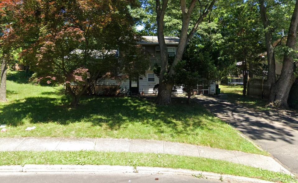 20 Charles Lane Spring Valley, NY 10977 - Photo 1 of 2 View of front of house with a front yard
