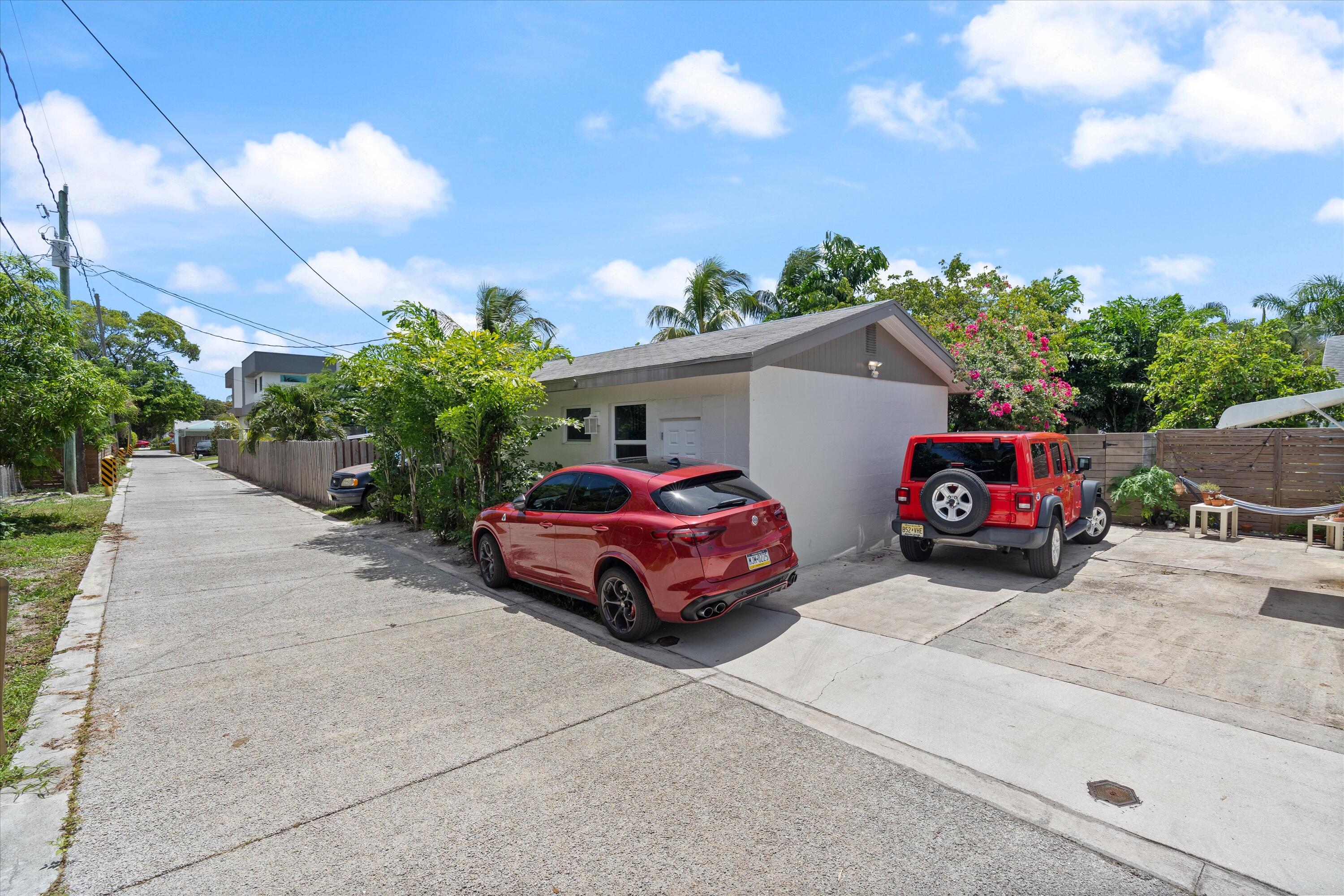 321 South Swinton Avenue Delray Beach, FL 33444 - Photo 13 of 30 a car parked in front of a house