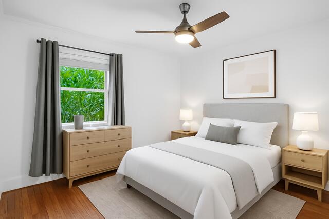 321 South Swinton Avenue Delray Beach, FL 33444 - Photo 19 of 30 a bedroom with a bed and a window