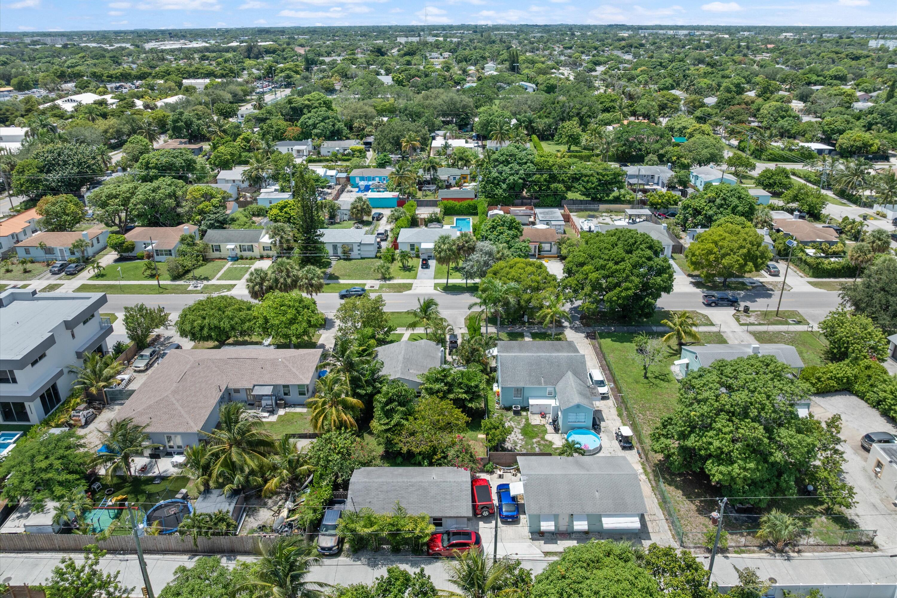 321 South Swinton Avenue Delray Beach, FL 33444 - Photo 9 of 30 an aerial view of residential houses with outdoor space and street view