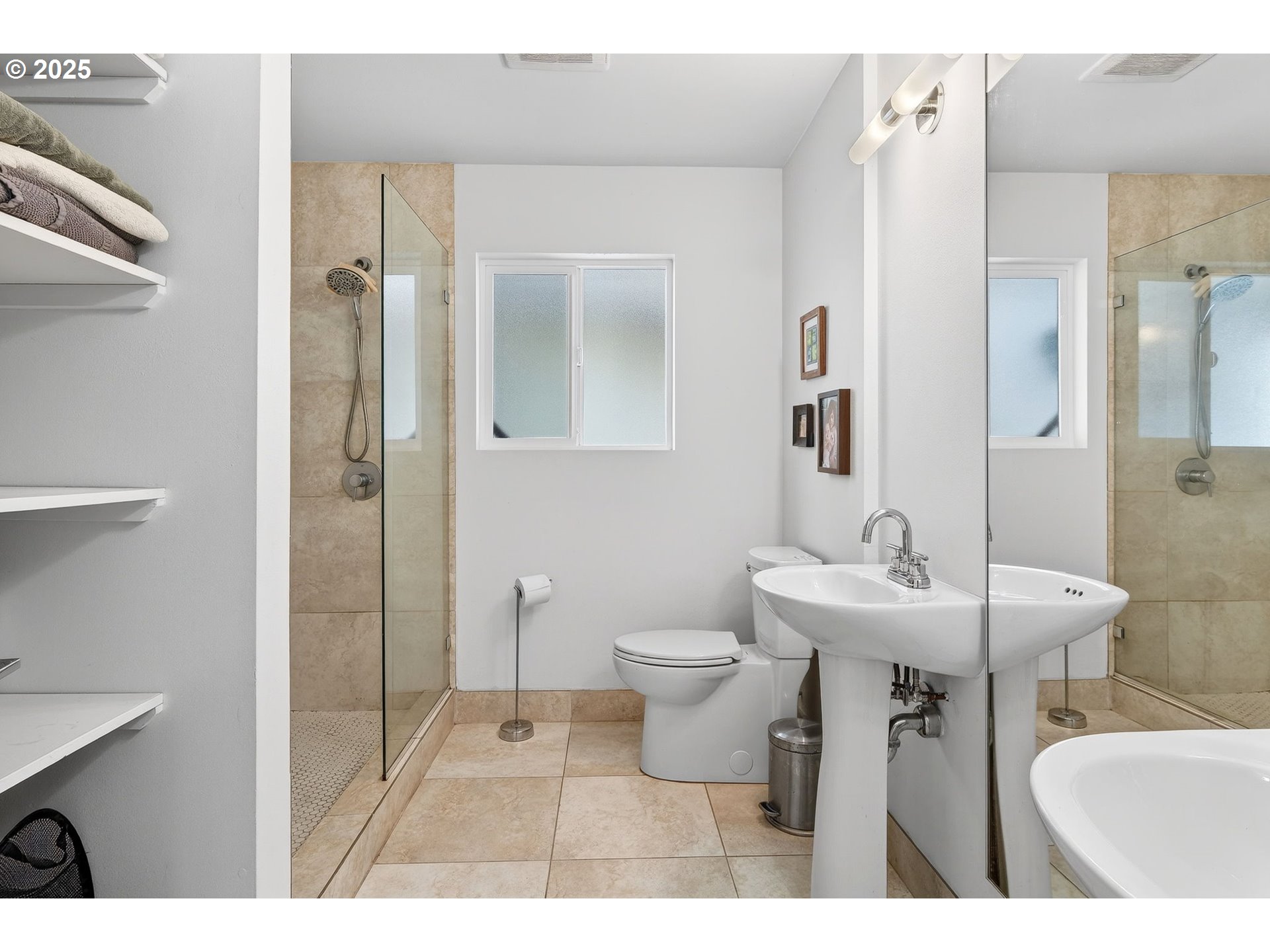 173 Northeast Bridgeton Road, Unit 13 Portland, OR 97211 - Photo 14 of 22 a bathroom with a sink toilet and shower