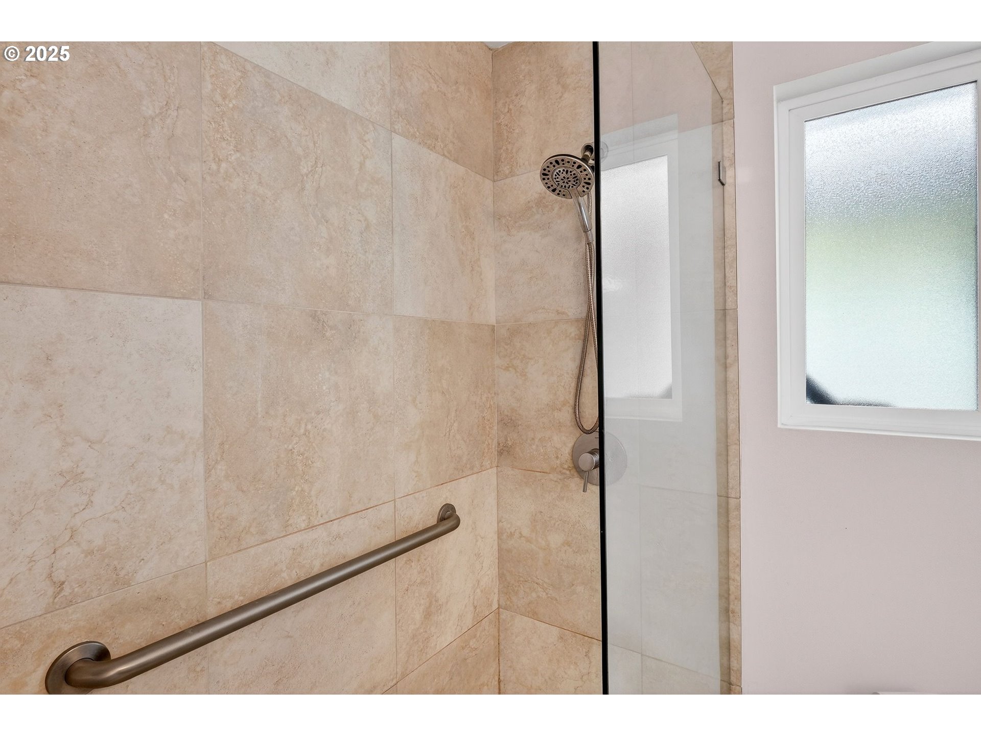 173 Northeast Bridgeton Road, Unit 13 Portland, OR 97211 - Photo 16 of 22 a bathroom with a shower