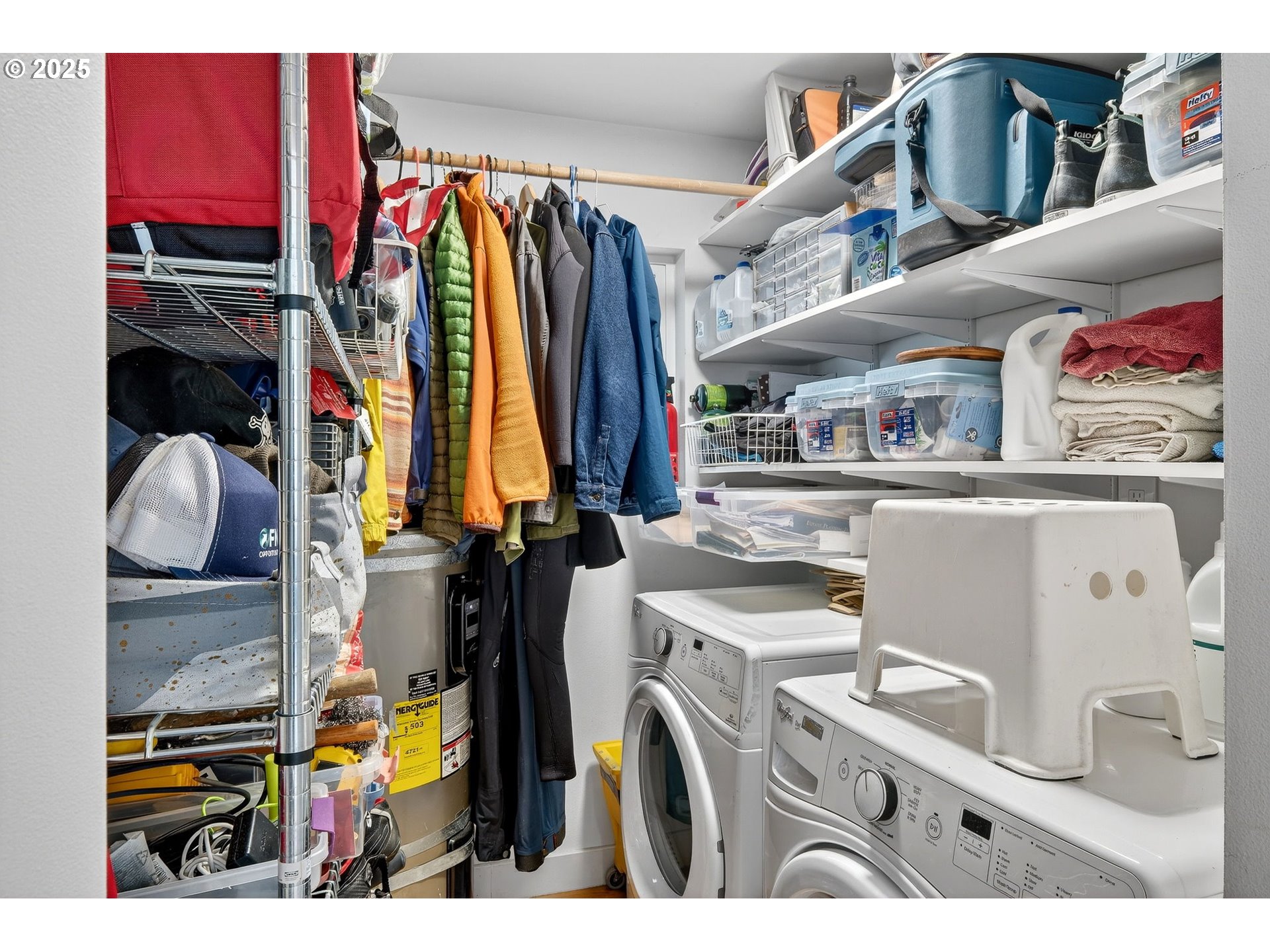 173 Northeast Bridgeton Road, Unit 13 Portland, OR 97211 - Photo 17 of 22 a view of walk in closet with clothes and shoes