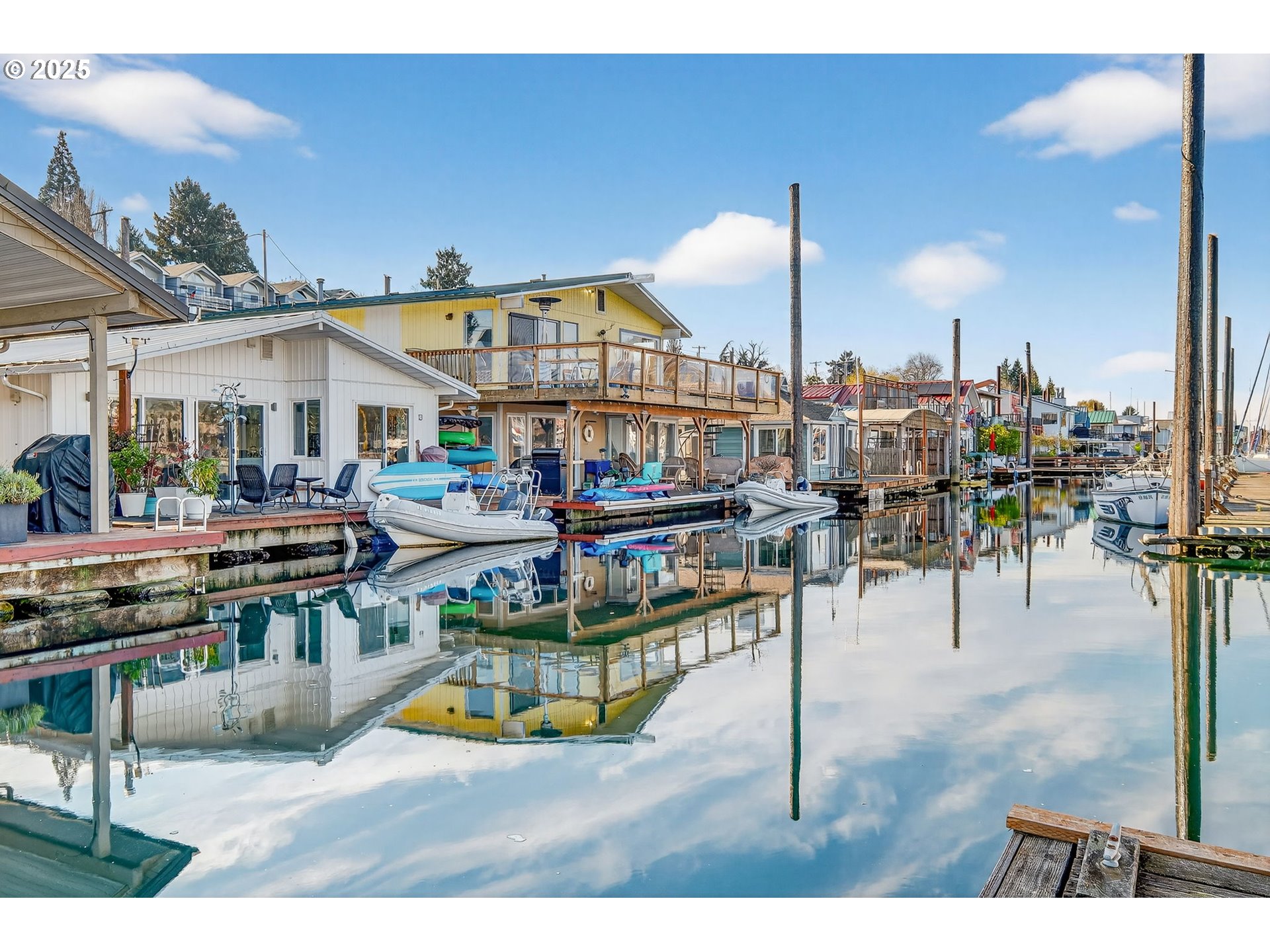 173 Northeast Bridgeton Road, Unit 13 Portland, OR 97211 - Photo 18 of 22 a view of a swimming pool with outdoor seating