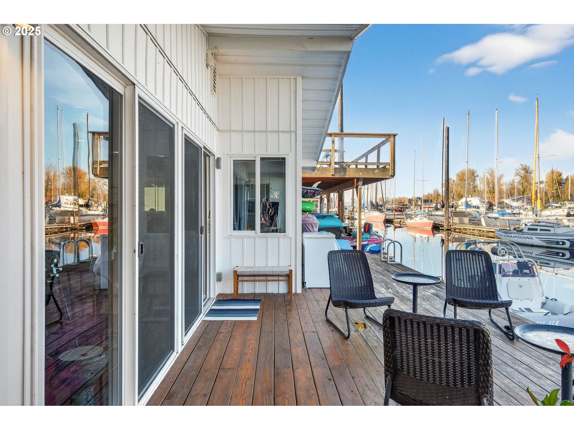 173 Northeast Bridgeton Road, Unit 13 Portland, OR 97211 - Photo 19 of 22 a dining room with furniture and wooden floor