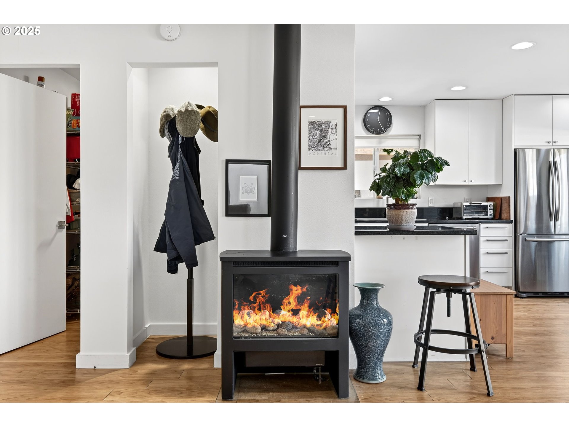 173 Northeast Bridgeton Road, Unit 13 Portland, OR 97211 - Photo 6 of 22 a living room with furniture and a flat screen tv