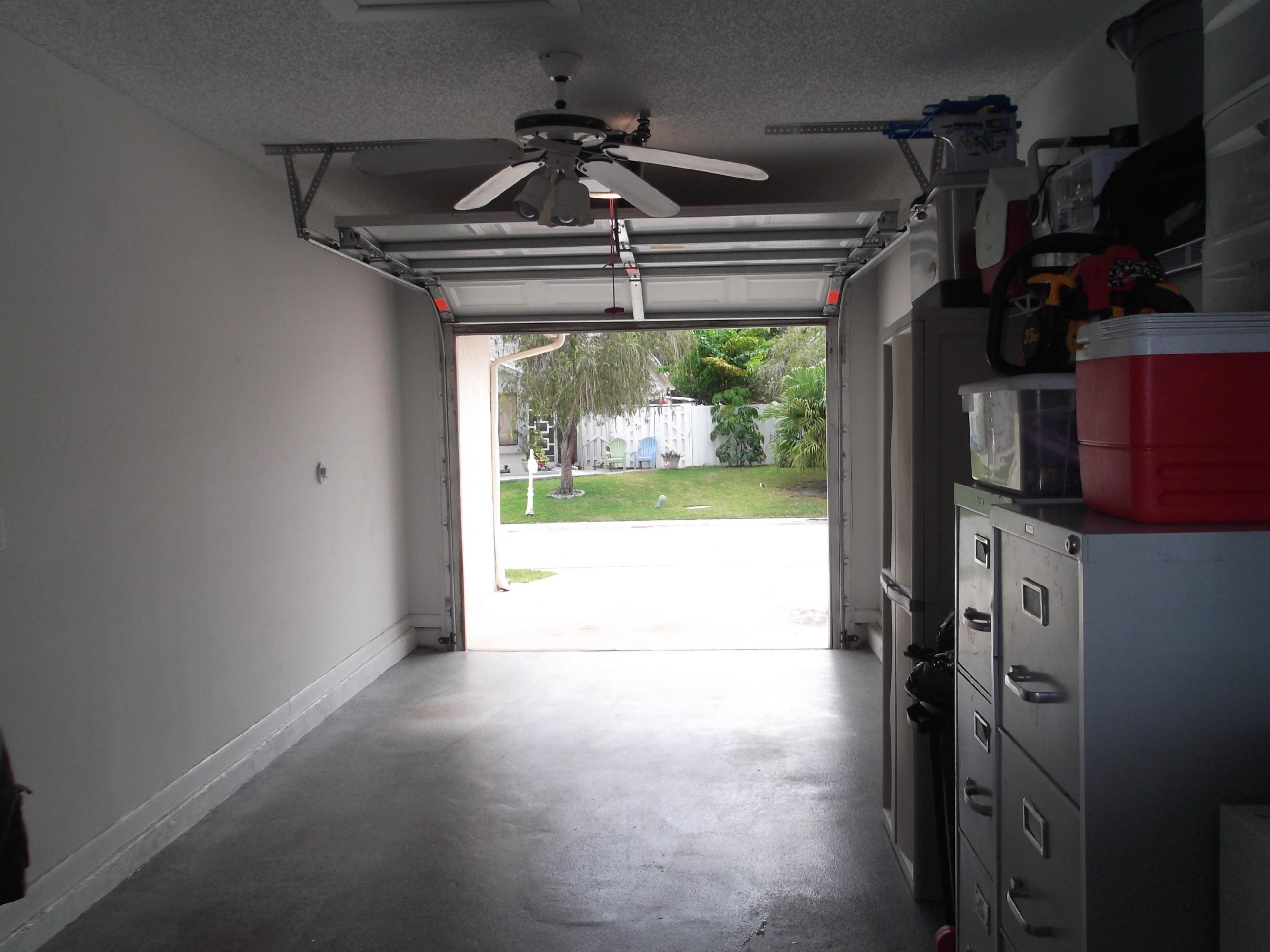 9665 Golf State Park Way Boca Raton, FL 33428 - Photo 13 of 22 a view of room with window and entryway