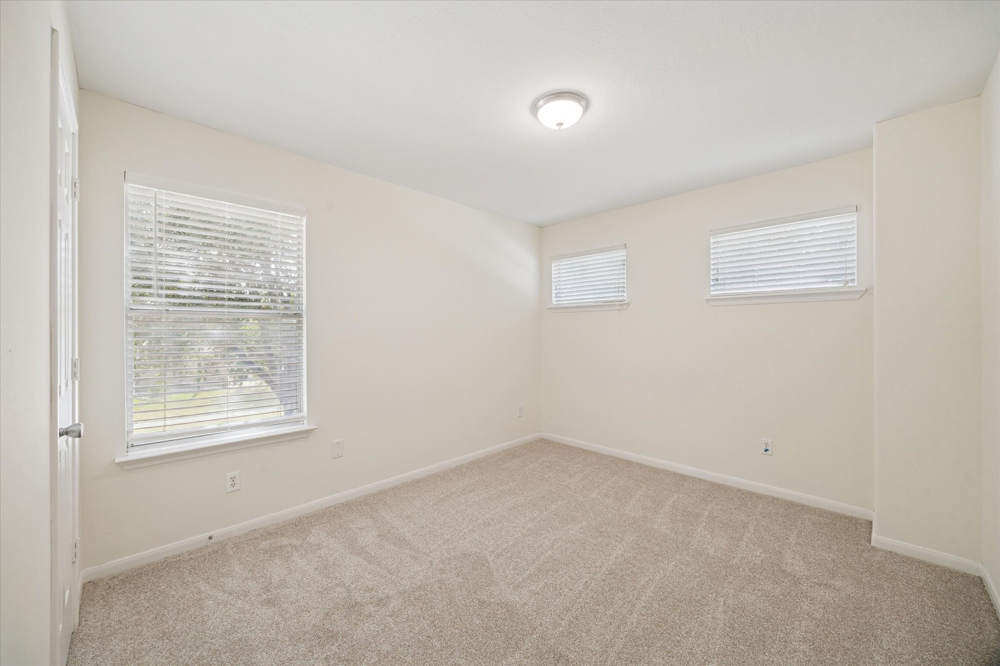 14102 Kinsbourne Lane Houston, TX 77014 - Photo 10 of 13 Second bedroom with new carpet and pad.