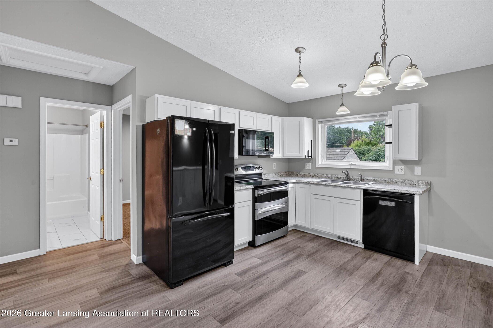 5105 Hughes Road Lansing, MI 48911 - Photo 11 of 26 15-5105-Hughes-Rd-WindowStill-Photograph