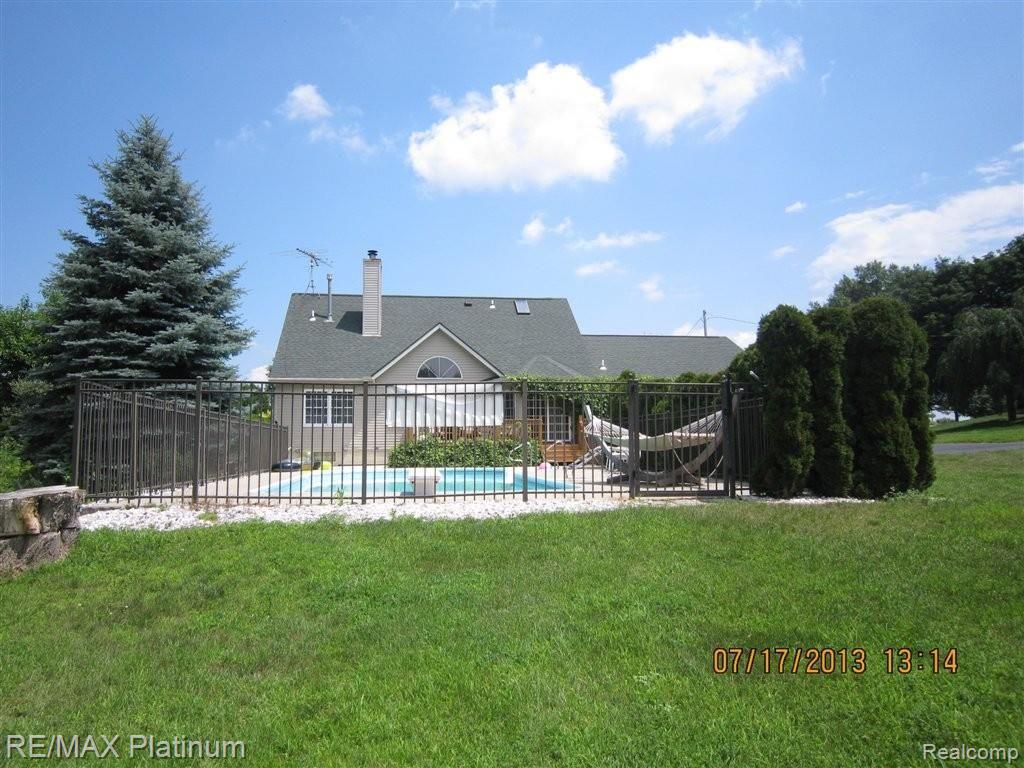 4203 North Latson Road Howell, MI 48855 - Photo 19 of 34 LATSON RD BACK EXTERIOR