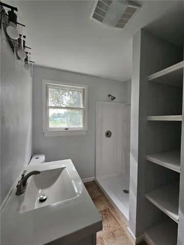 a bathroom with a sink and a tub