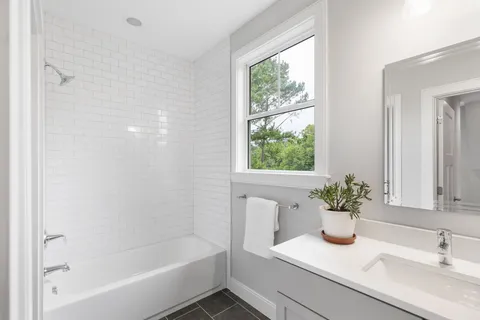 a bathroom with a sink and a bathtub