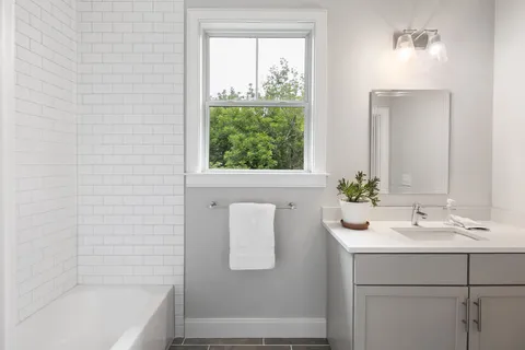 a bathroom with a sink and a bathtub