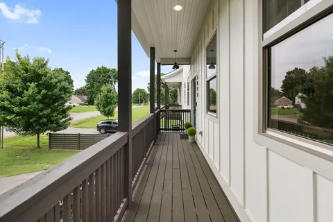 a view of a balcony with an outdoor space