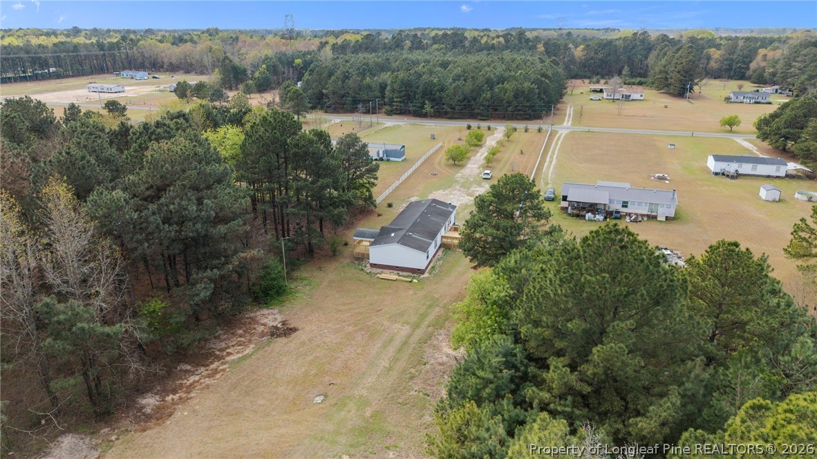 515 Mt Zion Road Red Springs, NC 28377 - Photo 50 of 50 an aerial view of a house with a yard and lake view