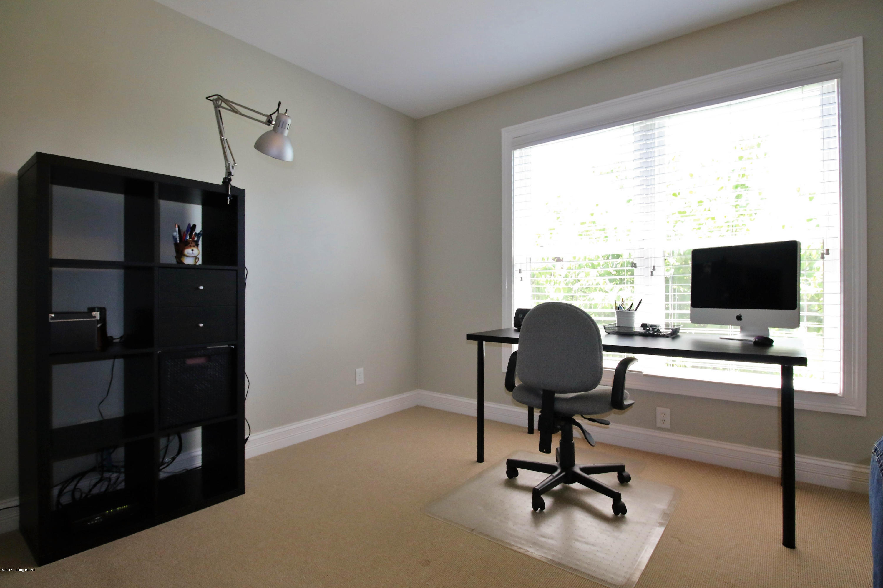 2904 Doe Ridge Court Prospect, KY 40059 - Photo 22 of 86 This bedroom is currently being used as a office and features a large walk-in closet.