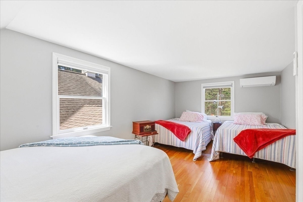 12 Salt Marsh Lane Wareham, MA 02571 - Photo 22 of 41 a bedroom with two beds and a window