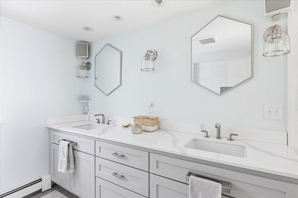 12 Salt Marsh Lane Wareham, MA 02571 - Photo 27 of 41 a bathroom with a sink and a mirror