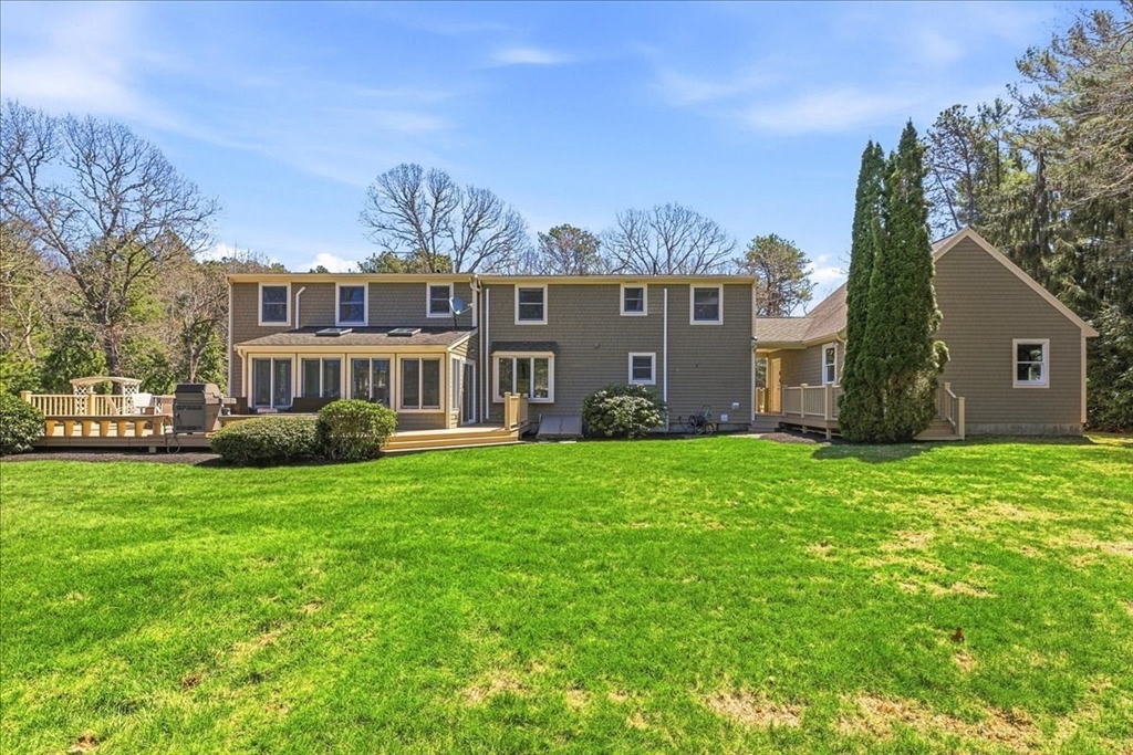 12 Salt Marsh Lane Wareham, MA 02571 - Photo 32 of 41 front view of a house with a yard