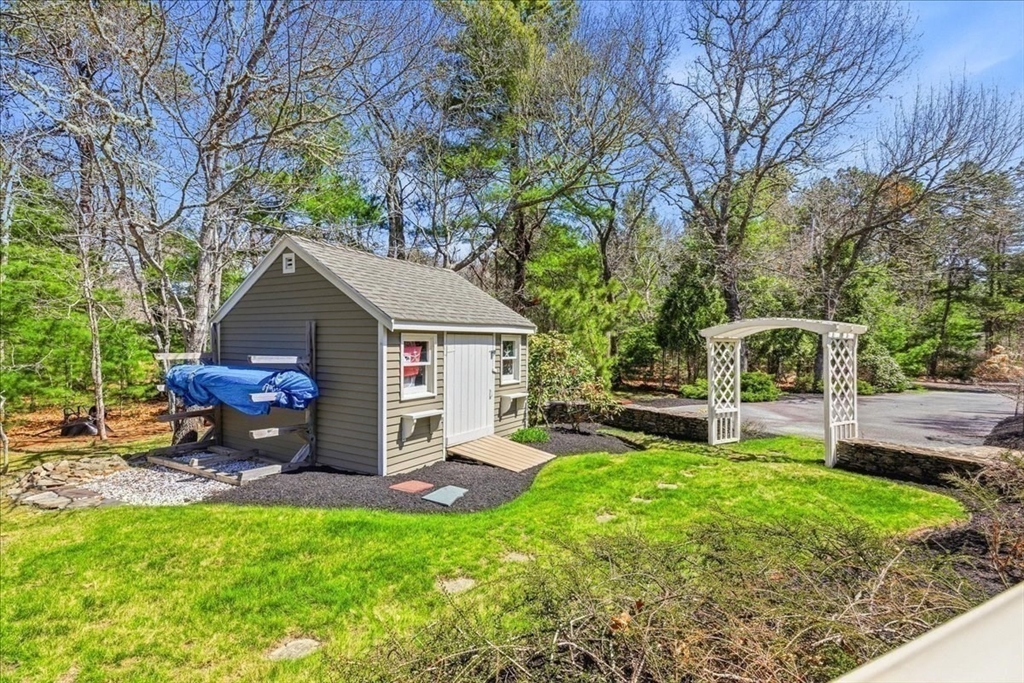 12 Salt Marsh Lane Wareham, MA 02571 - Photo 35 of 41 a front view of house with yard and green space