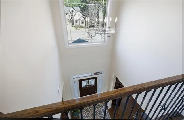 a bathroom with a double vanity sink and mirror with shower