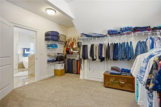 a living room with a fireplace and a flat screen tv
