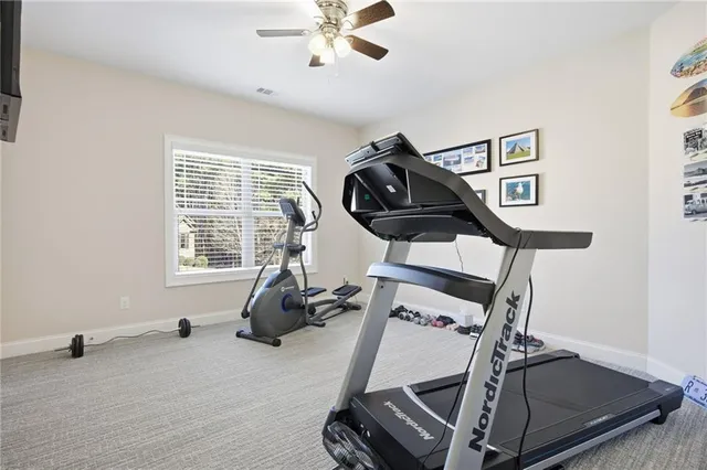 a view of a two chairs in the patio