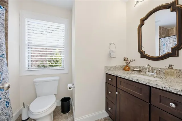 a view of a backyard with trees