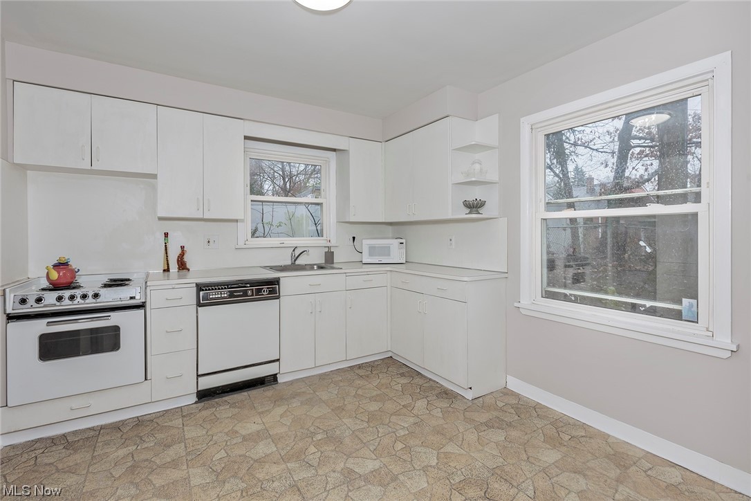 4402 Bayard Road South Euclid, OH 44121 - Photo 10 of 27 Spacious kitchen with
white cabinetry and all
appliances
