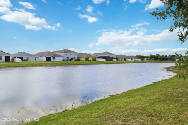 a view of a city with lawn chairs