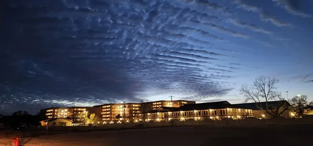 a view of room with furniture and chandelier
