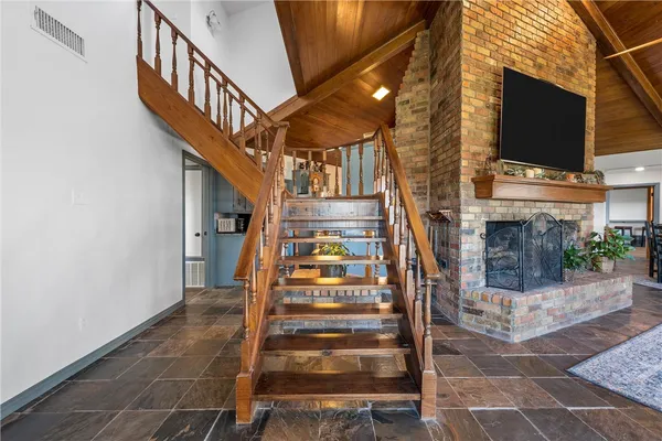 a view of entryway with a front door