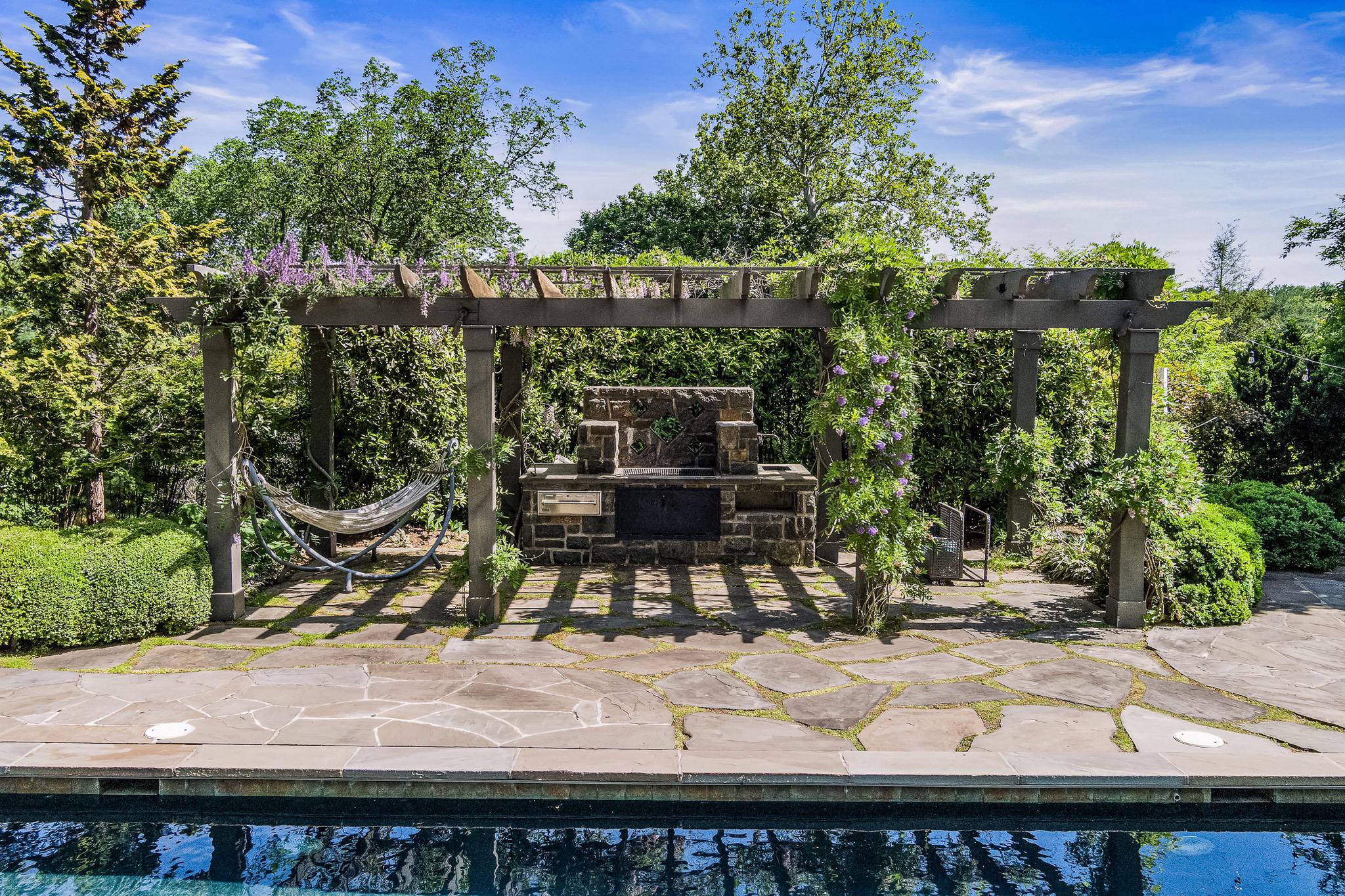 900 Army Road Baltimore, MD 21204 - Photo 56 of 99 Wisteria covered trellis with built-in grill