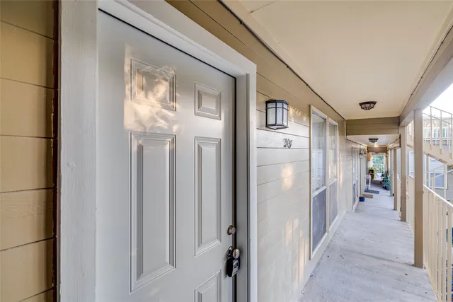 a view of a hallway with a elevator