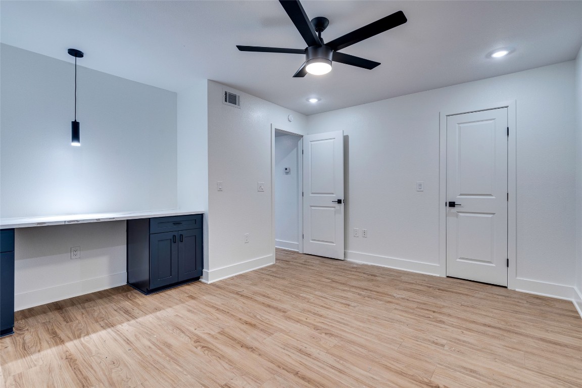 202 East 45th Street, Unit 202 Austin, TX 78751 - Photo 20 of 29 Unfurnished office featuring light wood finished floors, a ceiling fan, and recessed lighting